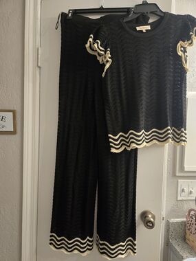 Solitaire Black Knit Sweater with Cream Label